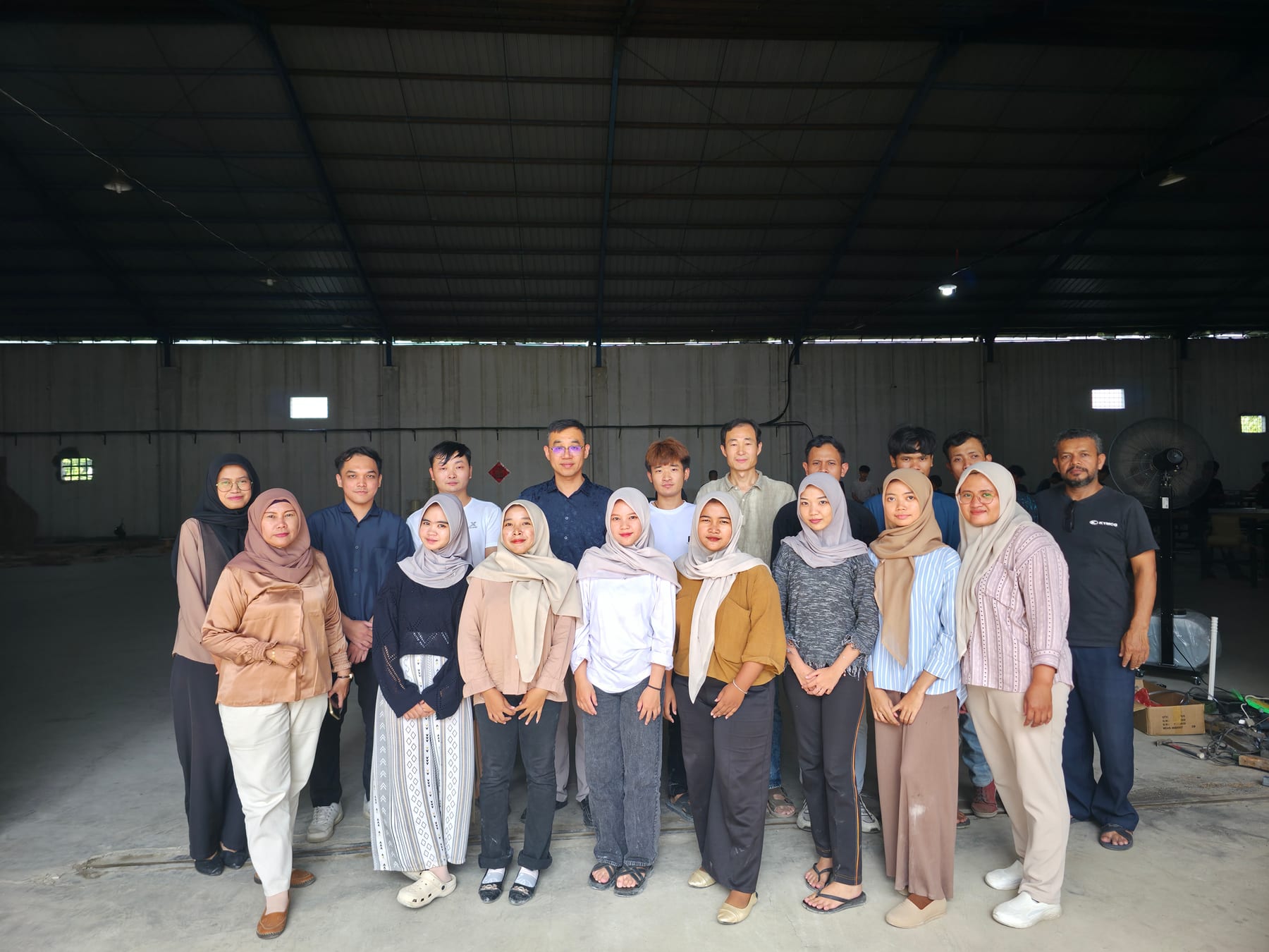 Greenlife Rattan factory team and visitors inside the Cirebon workshop